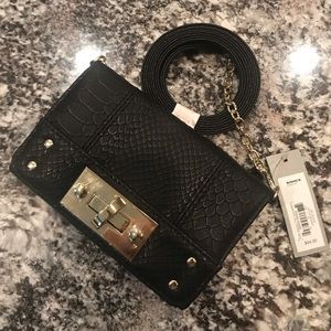 Apt.9 black wallet with optional strap.